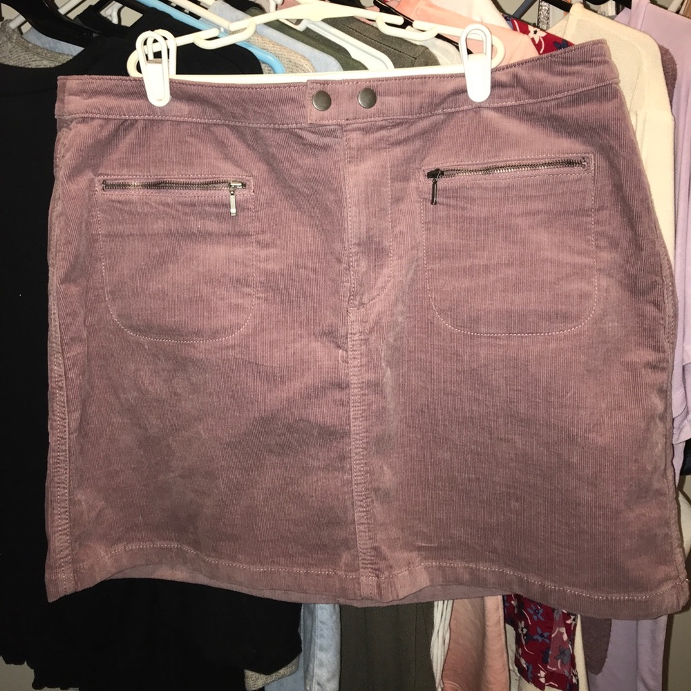 Light purple skirt with cute buttons and zippers!